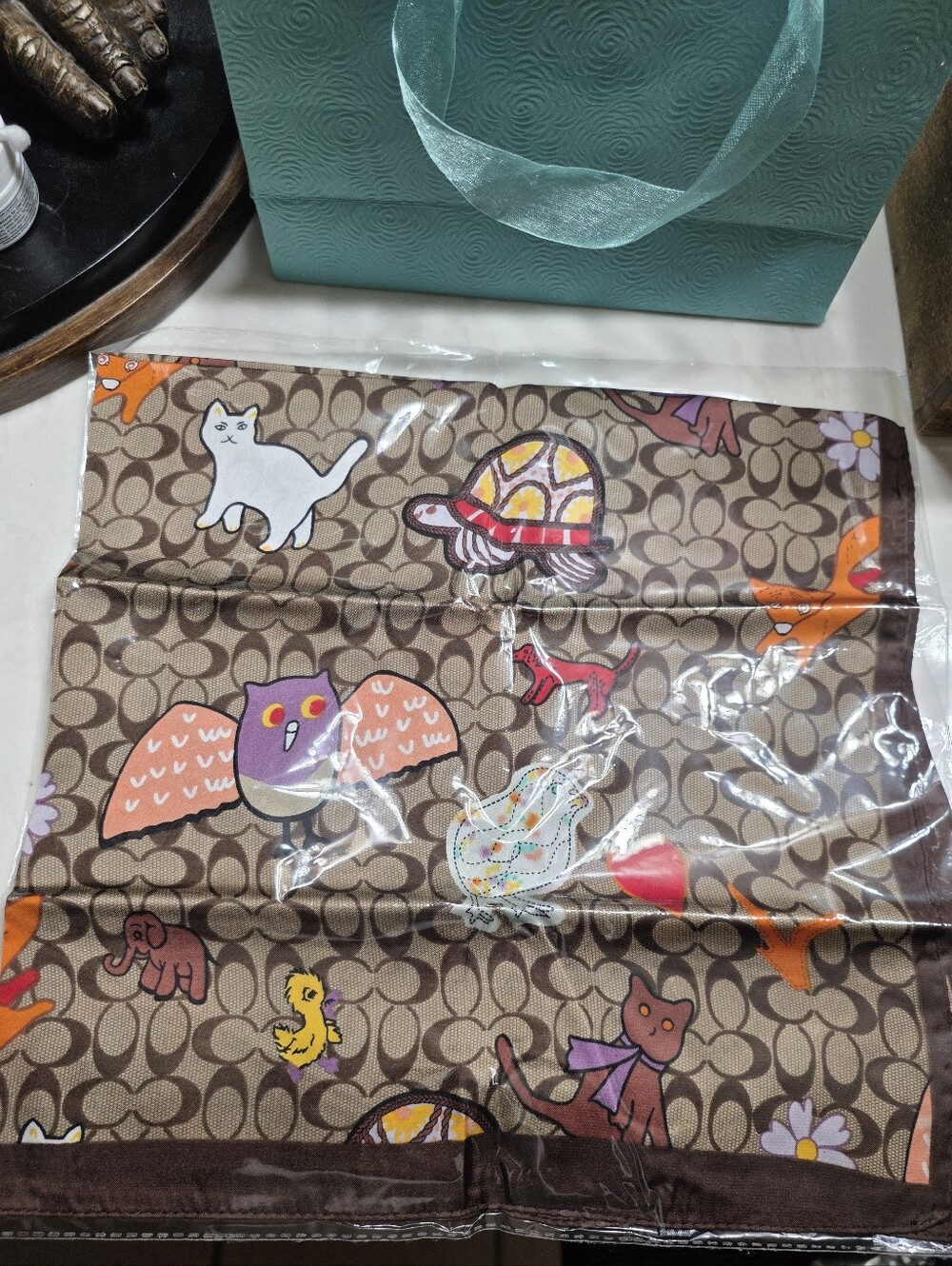 Coach Brown Signature Scarf with Colorful Animal Motifs
